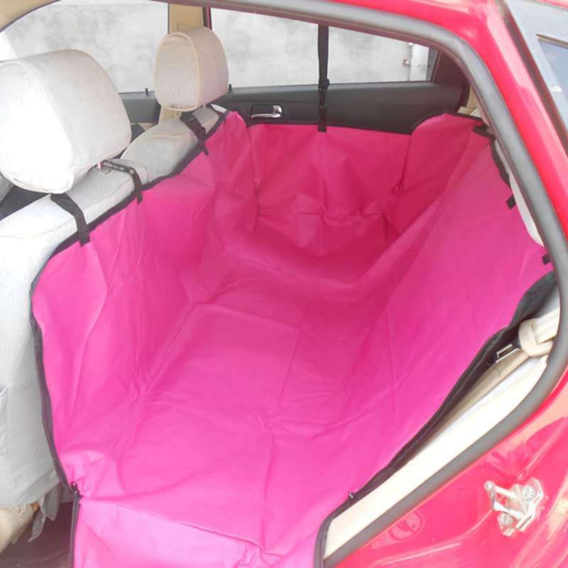 Back row cushion in pink covering rear bench and the back of front seats, with headrest straps