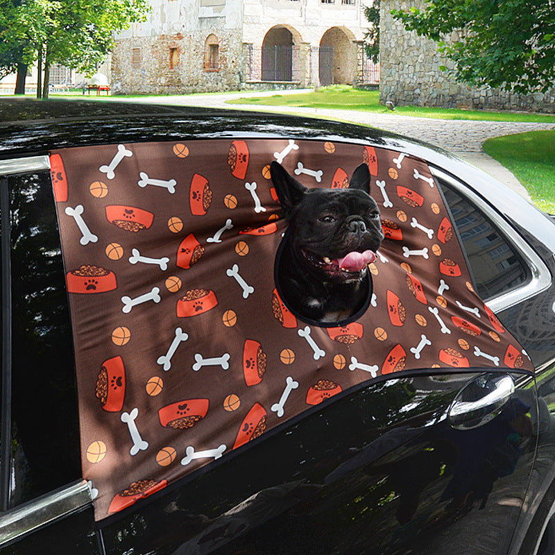 Style D (dark base with bones, bowls and balls print) installed on the side window; a French bulldog peeks out the central circular opening