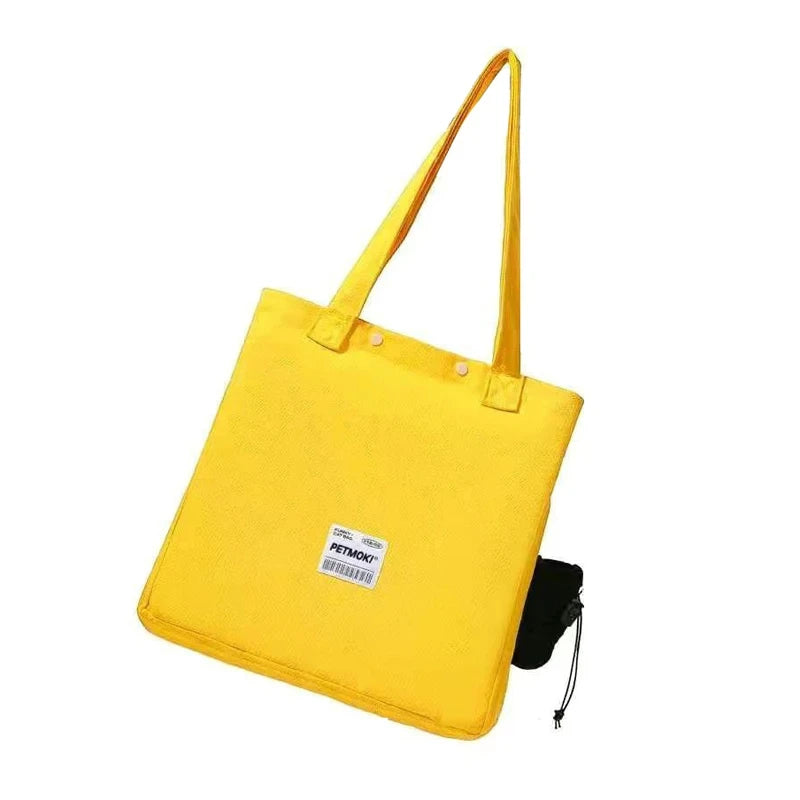 Yellow canvas pet carrier tote, white background