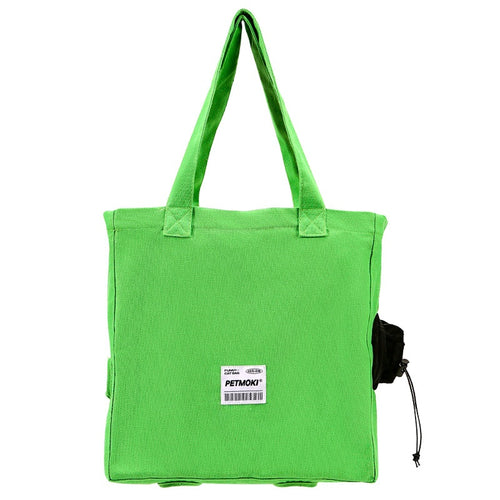 Green canvas pet carrier backpack, white background